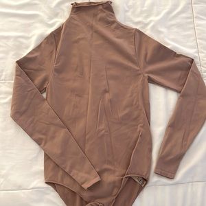 Brand new Skims bodysuit never worn